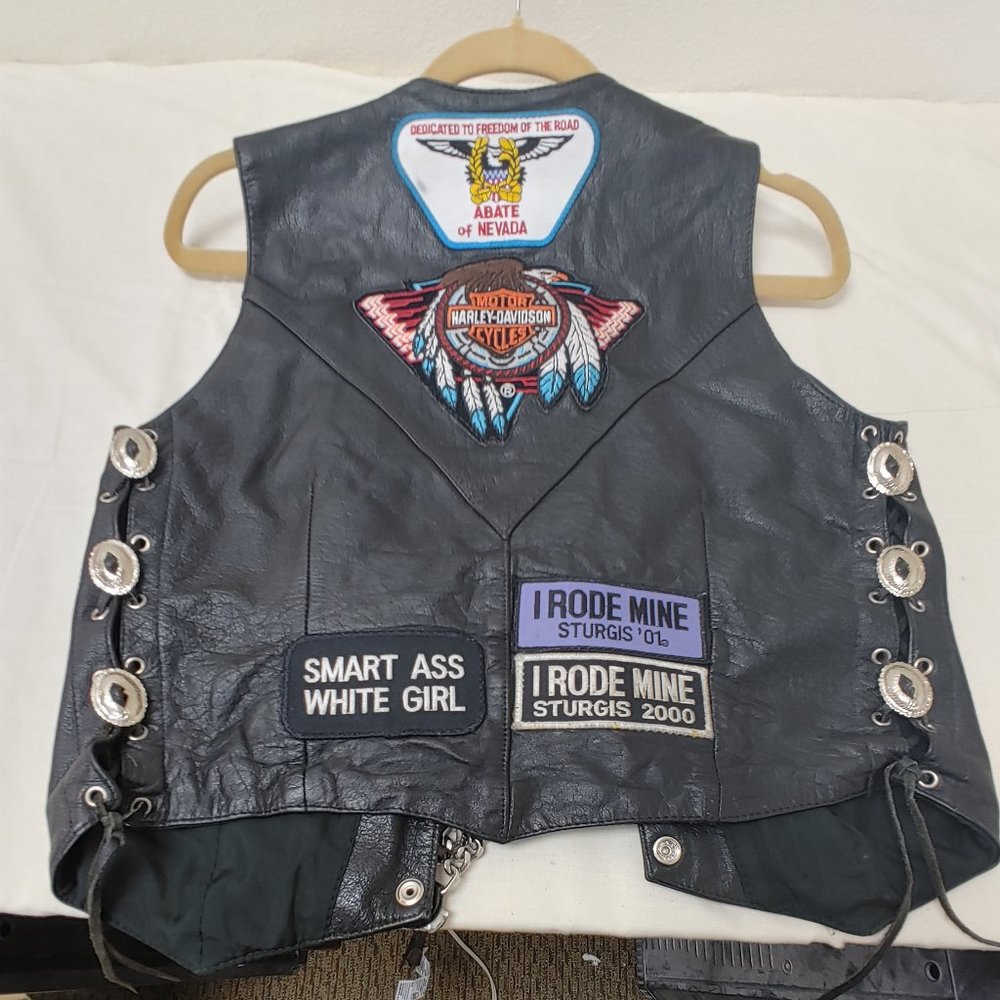 Hudson Leather woman's Leather vest with patches and pins size small
